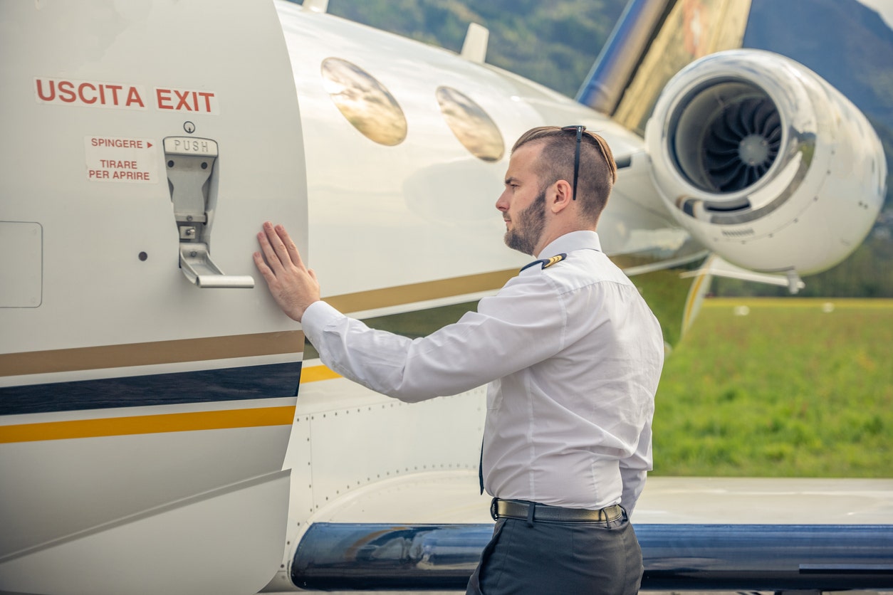 Why Touching the Airplane Before Boarding Has Travelers Divided