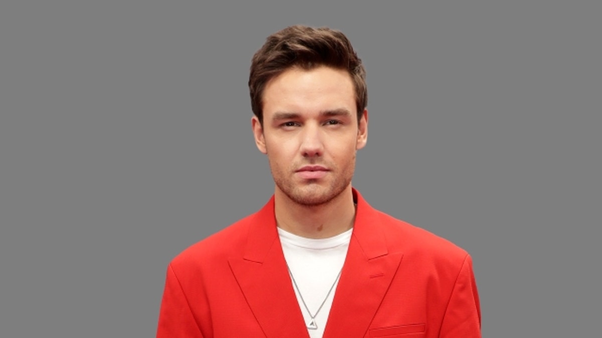 Liam Payne in a red blazer