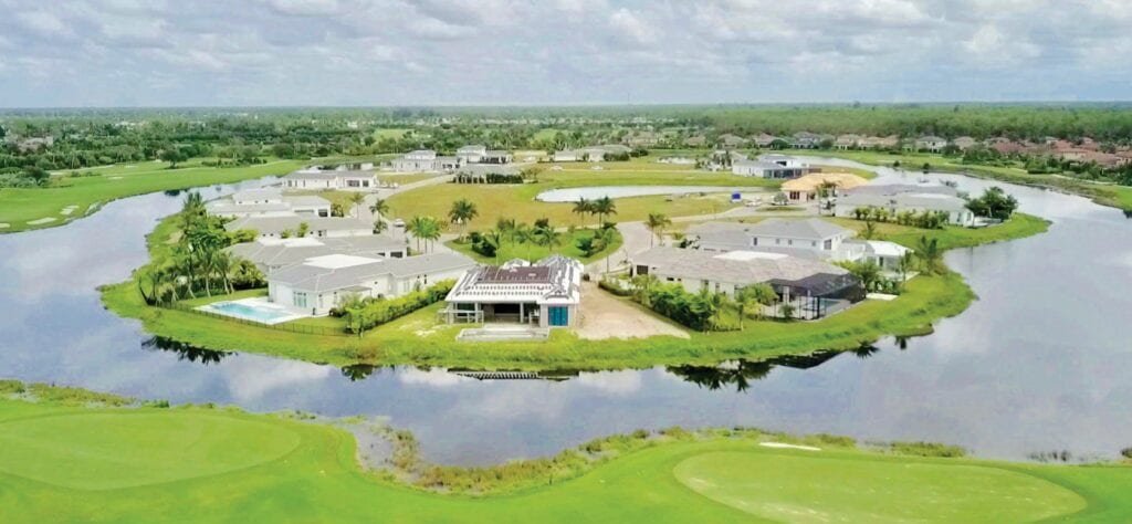Every home in Peninsula Treviso Bay overlooks a lake and the finishing holes of the community’s TPC golf course. Photo courtesy of Nick Ummarino Photography