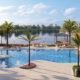 The Moorings Park Grande Lake residences have some of the best views in Naples, a range of floor plans, and expansive lanais.