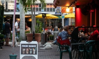 Patrons dine on the sidewalk along First Street in downtown Fort Myers. With the weather finally cooling, it's once again comfortable to dine al fresco.
