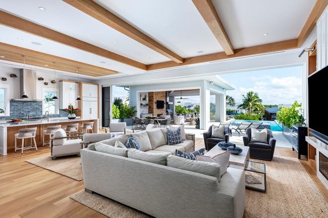 Yacht Clubs were the inspiration behind Collins DuPont Design Group’s interior design of a Mangrove Bay home.