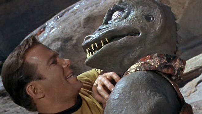 Captain Kirk (William Shatner) wrestles with The Gorn in an episode of the original