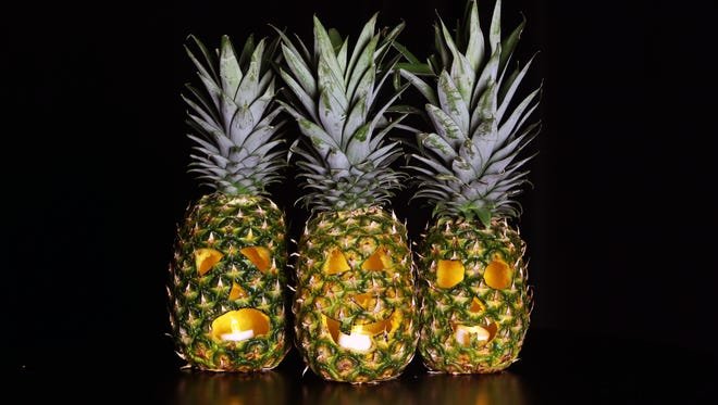 Carve pineapples instead of pumpkins this Halloween for a special, tropical-themed holiday.