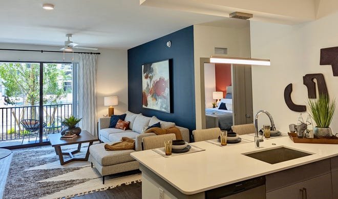 The first residential building at the luxury apartment community of Allura now showcases two beautifully furnished models, including a two-bedroom plan (shown).