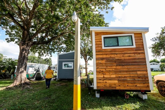 The tiny house on the right is the news one, then she got the middle one and the trailer just a few month apart, but says hardly a day goes buy someone isn't staying in her rentals. She is excited to get the new one listed. Lynzie Mackey of Fort Myers now has two tiny homes in a mobile home park along San Carlos blvd, in Fort Myers. Mackey just finished building out the second one. She uses them for nightly rentals and said it was hard to find a place that would let her do this. Want to live in a tiny home in SWFL? The options are few but here are some tips on where you can live in a tiny house and how much it will cost.