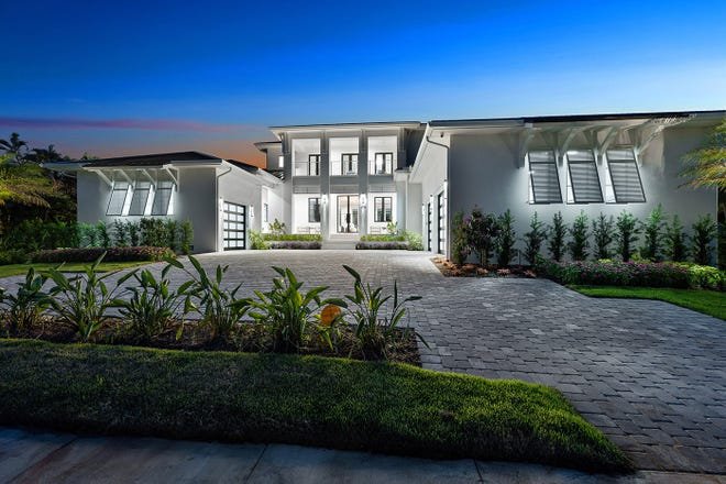 An exterior view of The Lykos Group’s latest Marco Island spec home at 1698 McIlvaine Court.