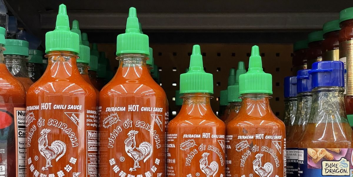 bottles of huy fong foods sriracha sauce are displayed on a news photo 1681321918.jpg