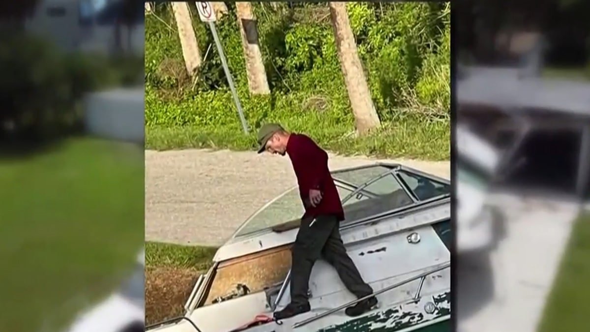 nbc2 man removed from dumped boat.jpg